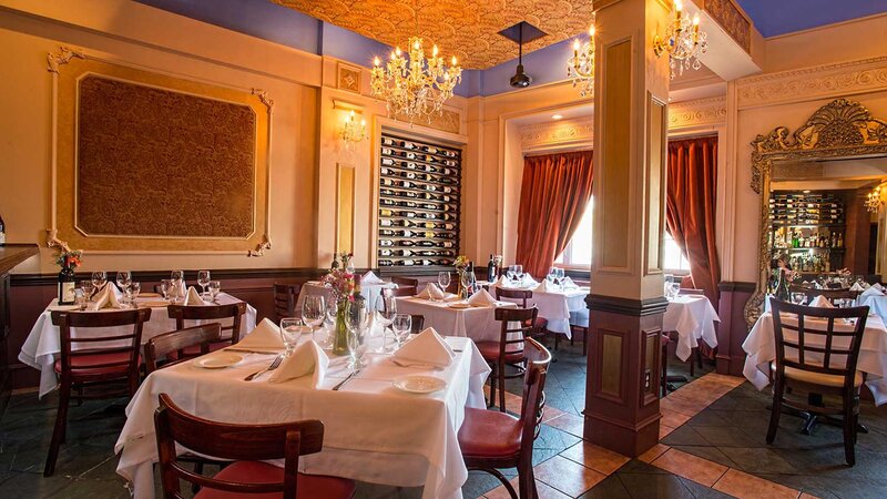 Dining room with view of set tables